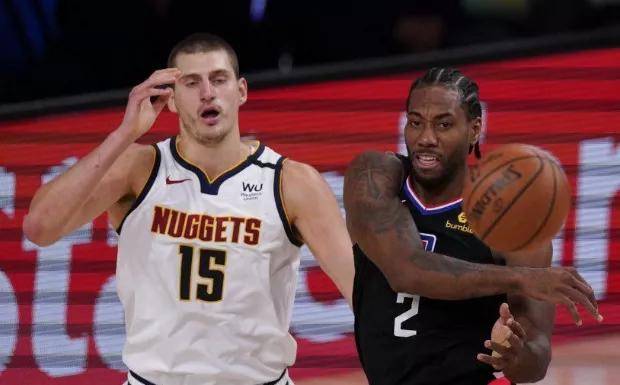 NBA焦点战，东契奇40+三双独行侠加时险胜快船